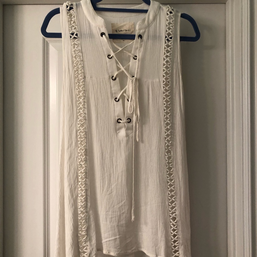 Long white tunic with cut out accents